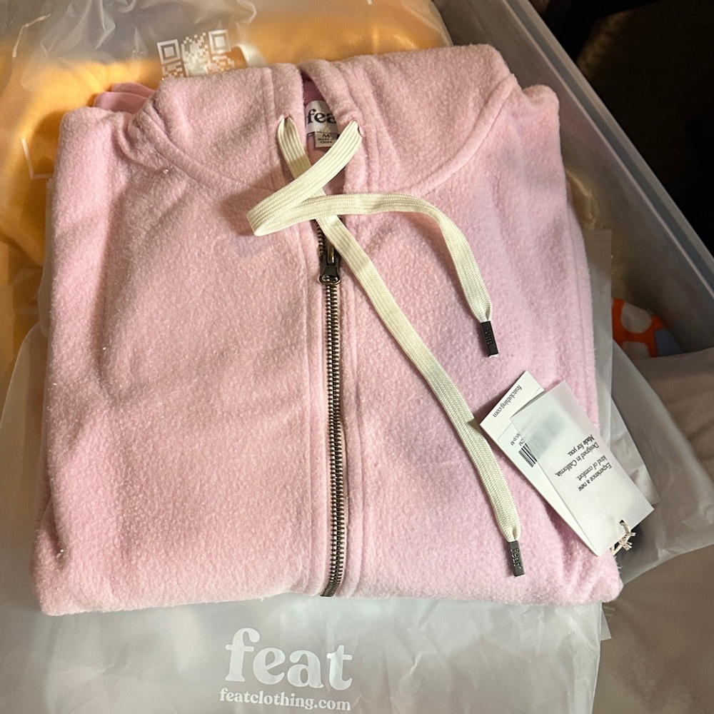 Feat Blanket Blend Zip Hoodie in Lavender Haze (looks like baby pink).